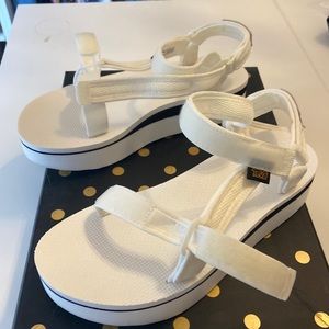White with black band platform Teva sandals sz9